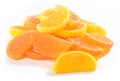 Heap of orange and lemon candy slices on a white Royalty Free Stock Photo