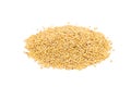 Heap of organic millet groats, sideview