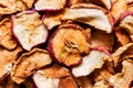 Heap of organic sun dried fruits dehydrated apples slices. Healthy diet wholefoods vegan winter beverages ingredients concept