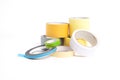 A heap of packing tape and a masking tape isolated on white background, with clipping path. adhesive tape. Scotch tape. Royalty Free Stock Photo
