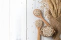 Heap of pearl barley on wood spoon with ear of barley Royalty Free Stock Photo