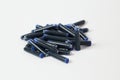 A heap of pen cartridges with blue ink Royalty Free Stock Photo