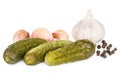 Heap of pickled gherkins, garlic and black pepper Royalty Free Stock Photo