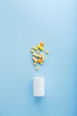 Pharmaceutical medicine pills and bottle on blue background Royalty Free Stock Photo