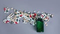 Heap of pills on grey background