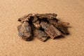 Heap of Pine Tree Bark Chip on Brown Cork Board Background Royalty Free Stock Photo