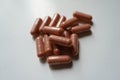 Heap of pink capsules of PQQ supplement Royalty Free Stock Photo