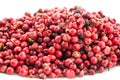 Heap of pink pepper in corns closeup Royalty Free Stock Photo