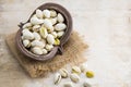 Heap of pistachio on wooden background