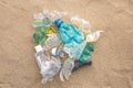 Heap of plastic garbage on sand