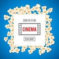 Heap popcorn for movie lies on blue background.