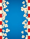 Heap popcorn for movie lies on blue background.