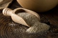 Heap of psyllium husk also called isabgol in wooden scoop and bowl on table Royalty Free Stock Photo