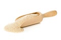 Heap of psyllium husk also called isabgol in wooden scoop over white background