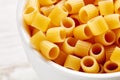 Heap of raw ditalini pasta in a white bowl Royalty Free Stock Photo