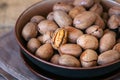 Heap of raw pecan nuts in a bowl Royalty Free Stock Photo