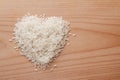 Heap of raw rice heart shape Royalty Free Stock Photo