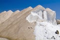 Heap of raw salt against blue sky