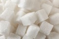 Heap of refined sugar cubes, closeup Royalty Free Stock Photo