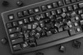 Heap of removed keys from a keyboard laying on the keyboard Royalty Free Stock Photo