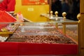 Heap of roasted almond on the stall at Christmas market. Royalty Free Stock Photo