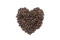 Roasted coffee beans arranged in a heart shape. isolated on a white background. Royalty Free Stock Photo