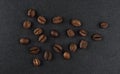 Heap of roasted coffee beans on black background Royalty Free Stock Photo