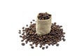 Roasted coffee beans and hemp bag. isolated on a white background. Royalty Free Stock Photo