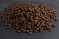 Heap of Roasted Coffee Beans on Slate Royalty Free Stock Photo