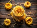 A Heap of Rustic Uncooked Durum Wheat Spaghetti Tied with Thread on a Dark Wooden Table Perfect for