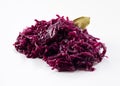 Heap of shredded red cabbage with bay leaf