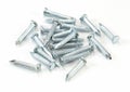 Heap of silver concrete nails texture Royalty Free Stock Photo
