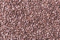 heap of small bronze nuggets background Royalty Free Stock Photo
