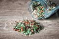 Heap of small pieces of dried vegetables in jar , dry celery, dry ccarrot and dry onion. Mix of spices Royalty Free Stock Photo