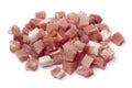 Heap of smoked bacon cubes isolated on white background Royalty Free Stock Photo