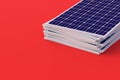 Heap of solar panels on red background. Global ecological trend