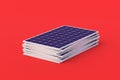 Heap of solar panels on red background. Global ecological trend