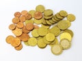 Heap of sorted euro money copper coins with a white background Royalty Free Stock Photo