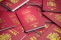 Heap of Spain passports. Immigration, citizenship, travel and tourism concept