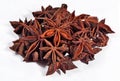 Heap of star anise on a white Royalty Free Stock Photo