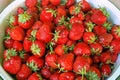 heap strawberries in big plate