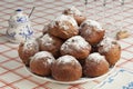Heap of sugared fried fritters or oliebollen
