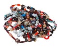 Heap of tangled natural stones necklaces