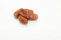 Heap of tasty dry dates or dates palm or palm phoenix dactylifera fruit isolate on a white backdrop. Royalty Free Stock Photo