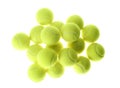 Heap of tennis balls on white background, top view. Sports equipment