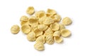 Heap of uncooked Orecchiette pasta close up on white background Royalty Free Stock Photo