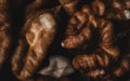 Heap of unshelled walnuts top view dark image full frame nuts macro