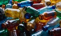 Heap of used empty multicolor plastic bottles, separate waste collection, environmental pollution, close-up background Royalty Free Stock Photo