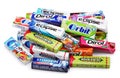 Heap of various brand chewing or bubble gum