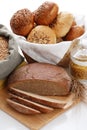 Heap of various bread, bag with wheat and macaroni Royalty Free Stock Photo